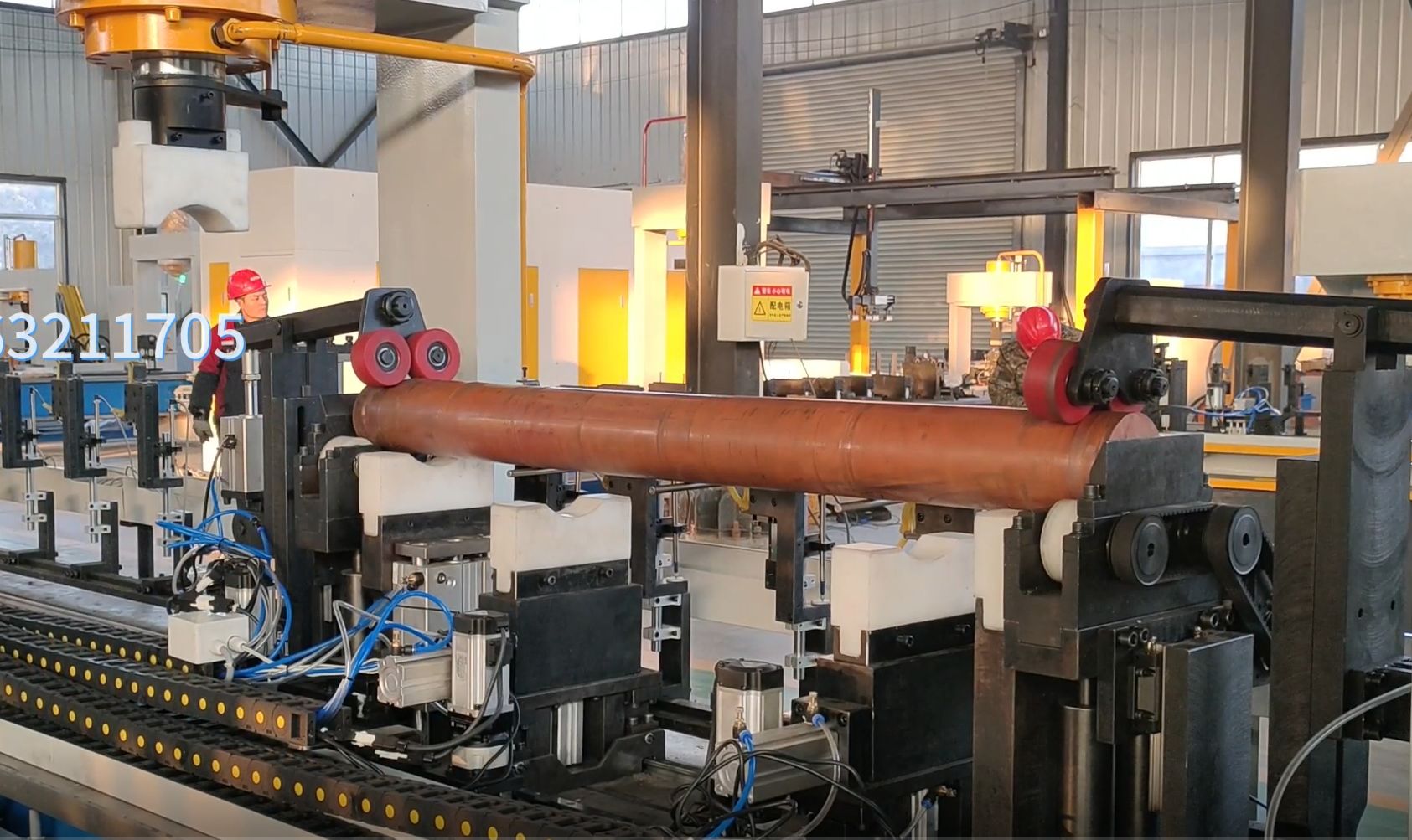 Thick brass rod approximately 250 millimeters diameter during straightening