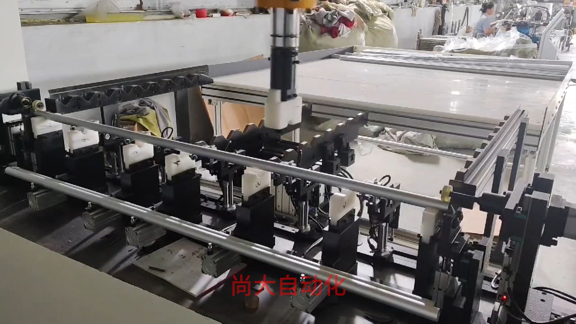 Heat-treated steel pipe during automatic straightening cycle
